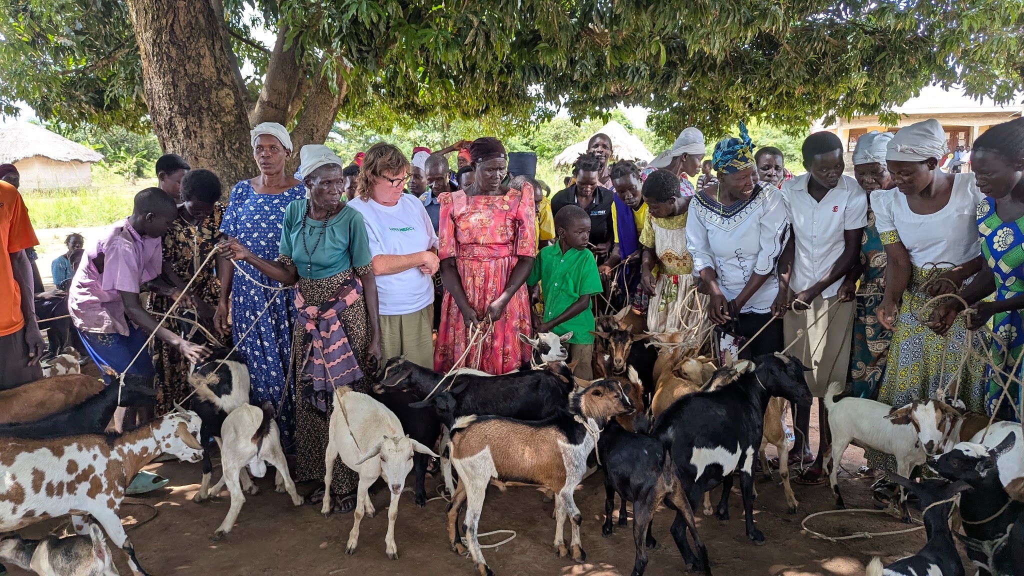 Uganda farmers with goats